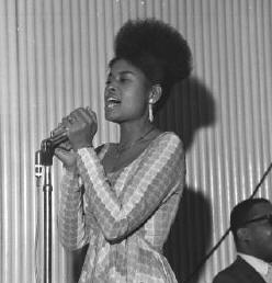 ABBEY LINCOLN,SINGER THEN(HAS AFRICAN NAME NOW).SHE IS MY FIRST BLACK IS BEAUTIFUL HAIR STYLE MENTOR AND TAUGHT ME HOW TO GO A NATURAL ETHIOPIAN UPSWEEP NATURAL)
